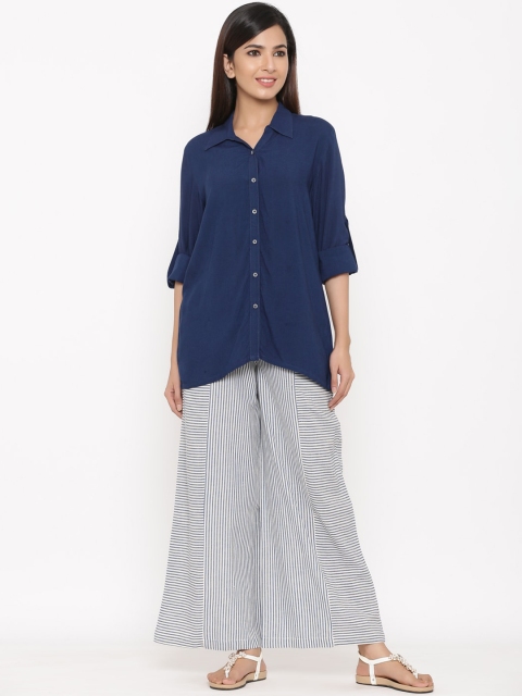 

Jaipur Kurti Women Navy Blue & White Solid Kurti with Trousers