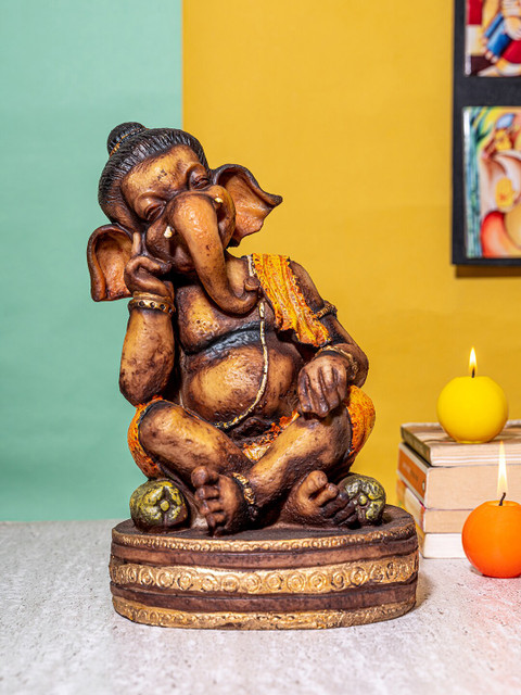 

TIED RIBBONS Brown & Orange Ganesh Idol