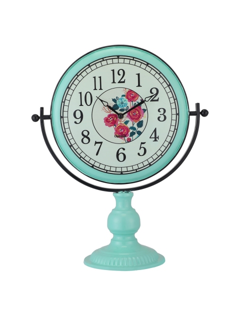 

Chumbak Blue Round Printed Analogue Table Clock
