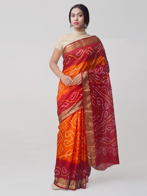 

Unnati Silks Orange & Maroon Pure Silk Dyed Bandhani Saree