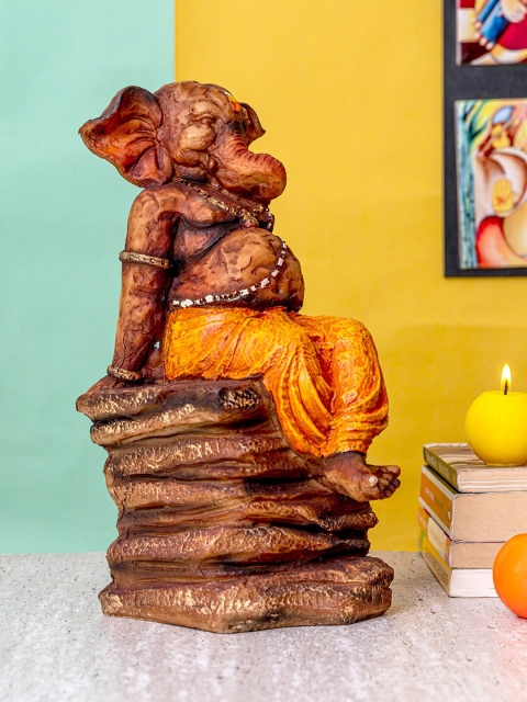 

TIED RIBBONS Orange & Brown Lord Ganesha Idol Showpiece