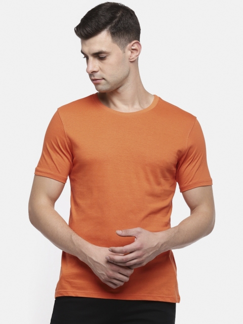 

Spiritus by pantaloons Men Orange Solid Round Neck Pure Cotton T-shirt