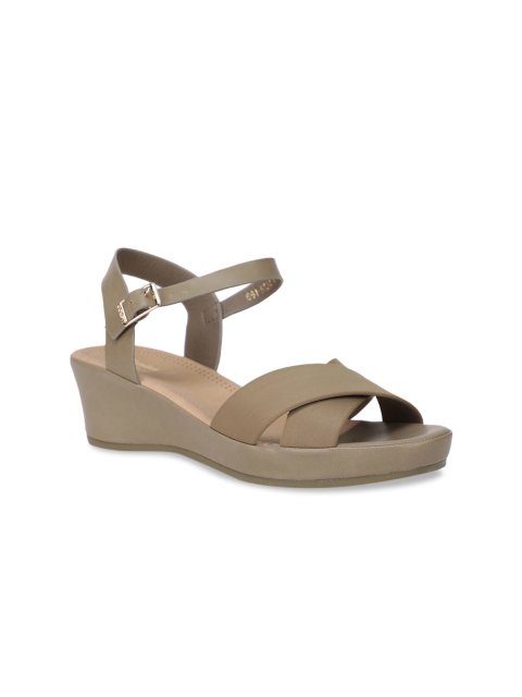 

Bata Women Beige Solid Wedges