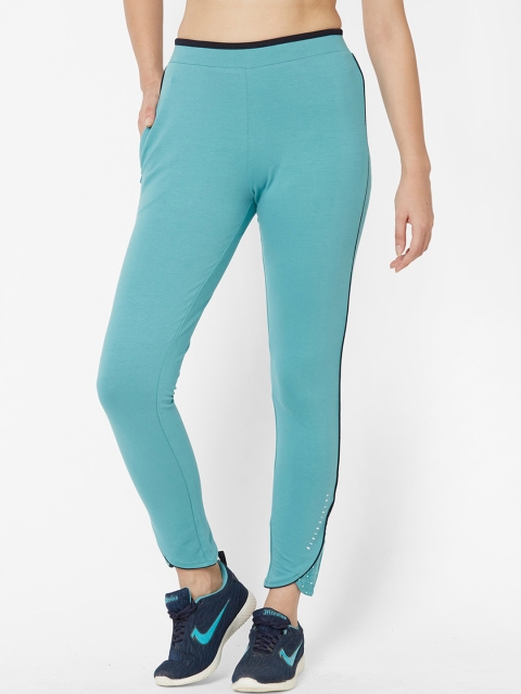 

Sweet Dreams Women Turquoise Blue Solid Slim-Fit Track Pants