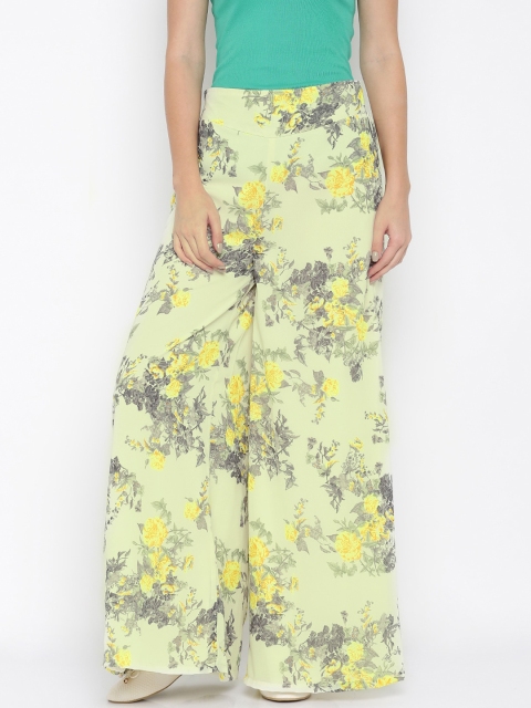 

Desi Weavess Women Green & Yellow Floral Printed Flared Palazzos