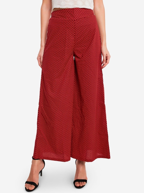 

Desi Weavess Women Red Printed Flared Palazzos