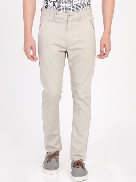 

Breakbounce Men Beige Slim Fit Solid Regular Cotton Trousers