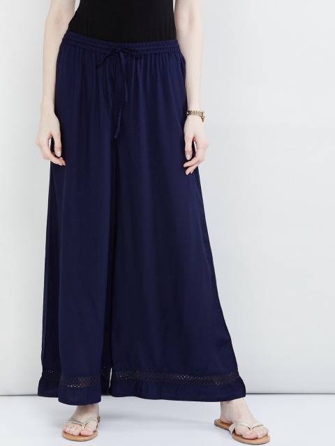 

max Women Blue Solid Woven Flared Fit Palazzos