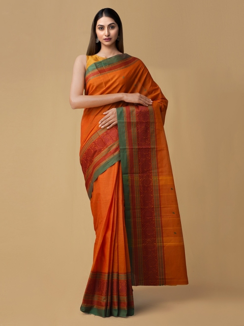 

Unnati Silks Orange Pure Cotton Solid Mysore Silk Saree