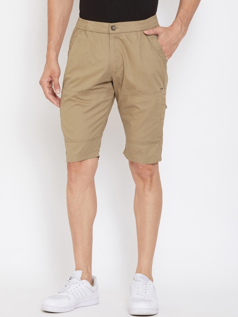 

Okane Men Beige Solid Regular Fit Chino Shorts