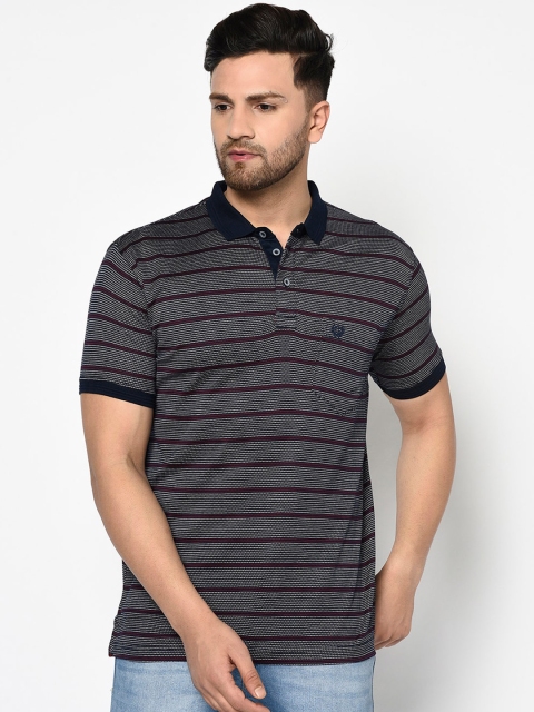 

Duke Men Blue Solid Polo Collar T-shirt