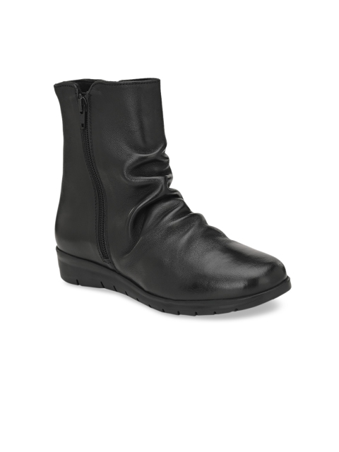 

Delize Women Black Solid Heeled Boots