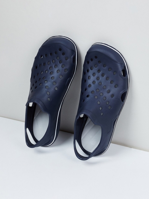 

max Men Navy Blue Solid Clogs