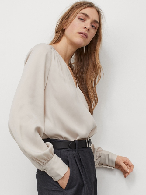 

H&M Women Beige Solid V-neck Top