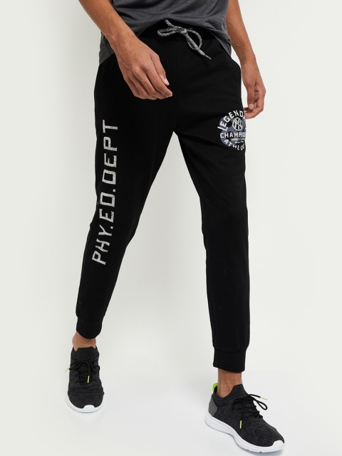 

max Men Black & White Solid Joggers