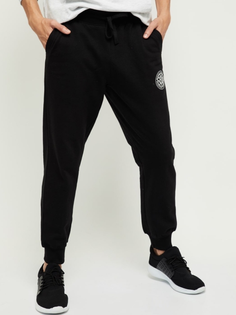 

max Men Black Solid Slim-fit Joggers