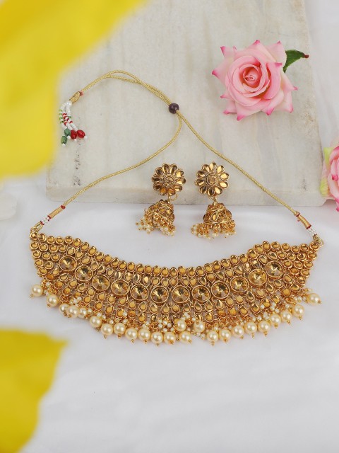 

ANIKAS CREATION Gold Plated Gold Kundan Studded & White Pearl Beaded Jadau Jewellery Set