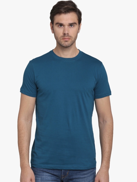 

JADE BLUE Men Blue Solid Round Neck T-shirt