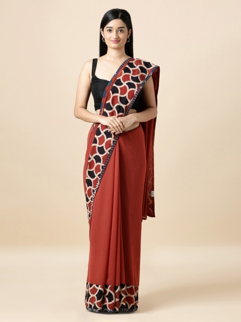

Taneira Red & Black Pure Georgette Solid Saree