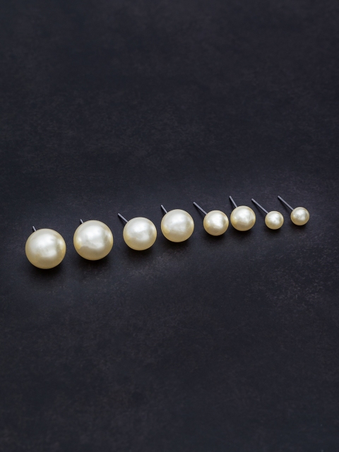 

Golden Peacock Set of 4 White Circular Studs