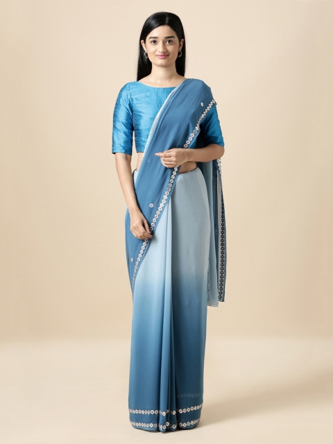 

Taneira Blue Pure Georgette Embellished Ombre Saree