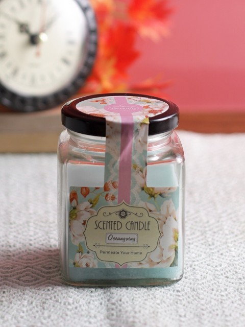 

Aapno Rajasthan Turquoise Blue Rosemary Scented Square Glass Jar Candle
