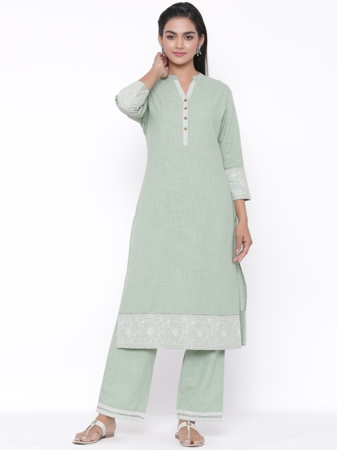 

fabGLOBAL Women Green Solid Kurti with Trousers