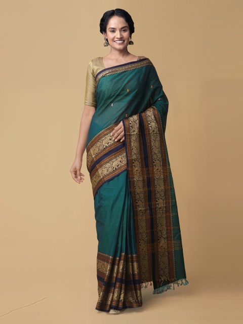

Unnati Silks Teal Pure Cotton Solid Handloom Kanjeevaram Saree