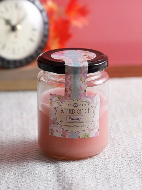 

Aapno Rajasthan Peach-Coloured Ginger Lily Scented Round Glass Jar Candle