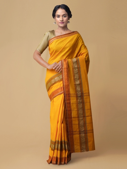 

Unnati Silks Yellow Pure Cotton Solid Kanjeevaram Saree