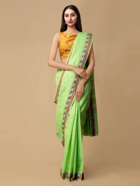 

Unnati Silks Green Pure Cotton Solid Kanjeevaram Saree