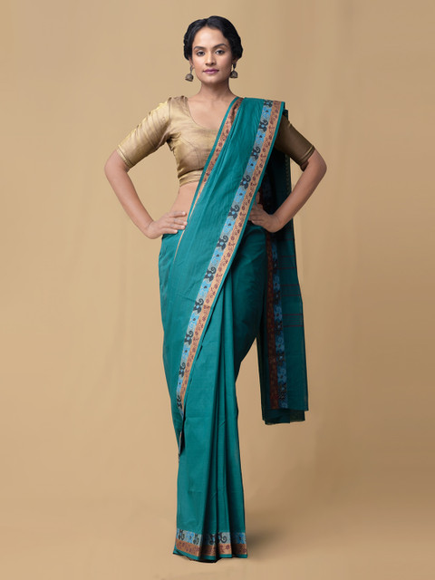 

Unnati Silks Green Pure Cotton Solid Kanjeevaram Saree