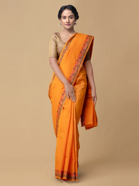 

Unnati Silks Orange Pure Cotton Solid Kanjeevaram Saree