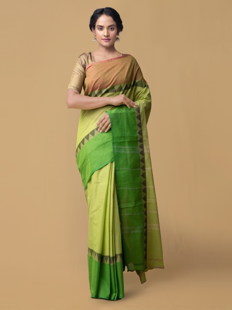 

Unnati Silks Green Pure Cotton Solid Kanjeevaram Saree