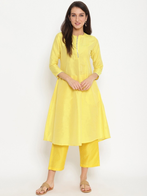 

Abhishti Women Yellow Solid Kurta with Trousers
