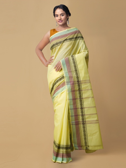 

Unnati Silks Yellow Pure Cotton Solid Kanjeevaram Saree