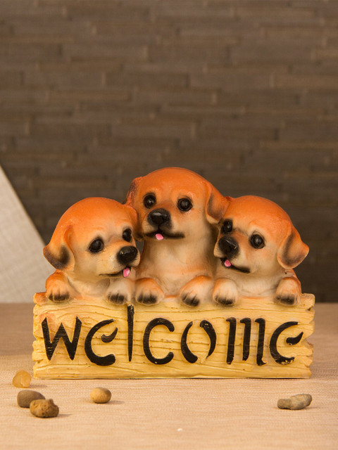

TIED RIBBONS Beige & Orange Decorative Welcome Dog Showpiece Figurine