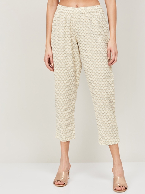 

Melange by Lifestyle Women Off-White & Yellow Tapered Fit Printed Regular Trousers