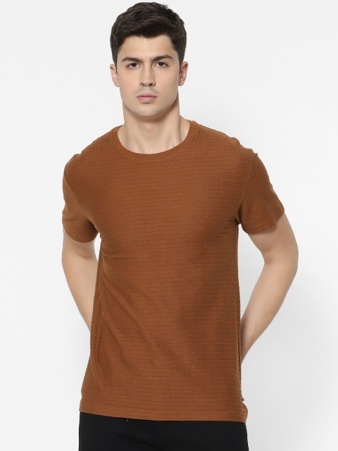 

Celio Men Brown Solid Round Neck T-shirt