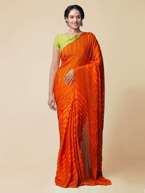 

Unnati Silks Orange Silk Blend Dyed Patola Saree