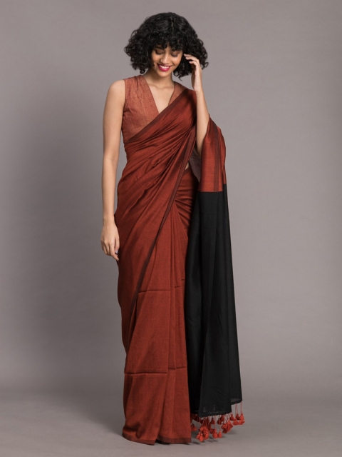 

Suta Rust & Black Cotton Blend Solid Saree