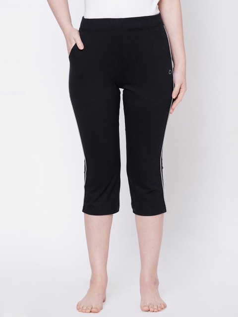

Sweet Dreams Women Black Solid Regular Fit Capris