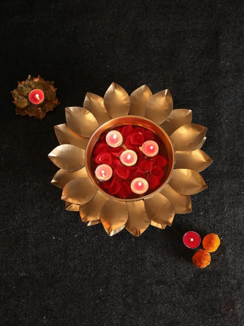 

Amoliconcepts Gold-Toned Lotus Design Decoration Urli Showpiece