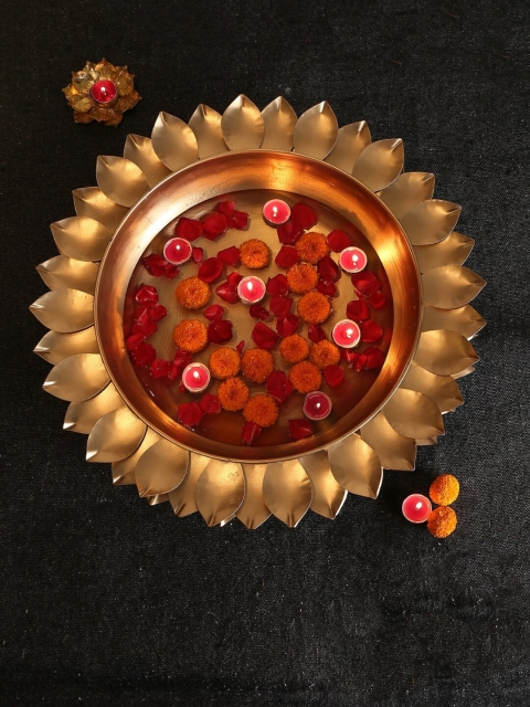 

Amoliconcepts Gold-Toned Lotus Design Decoration Urli Showpiece