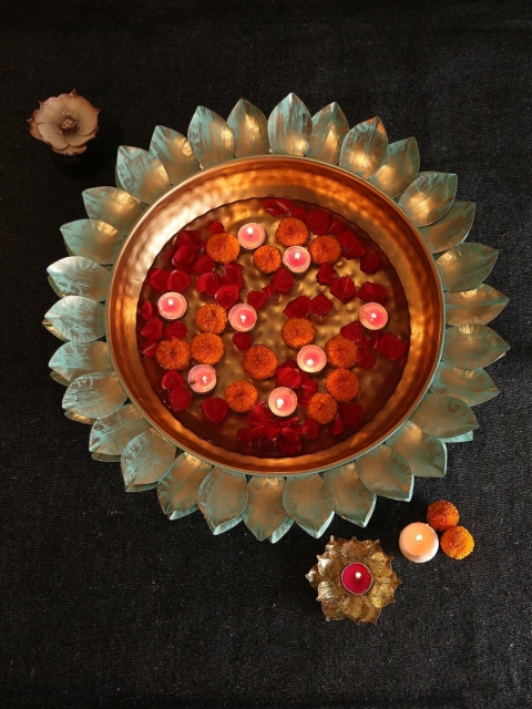 

Amoliconcepts Gold-Toned & Turquoise Blue Lotus Design Urli Showpiece