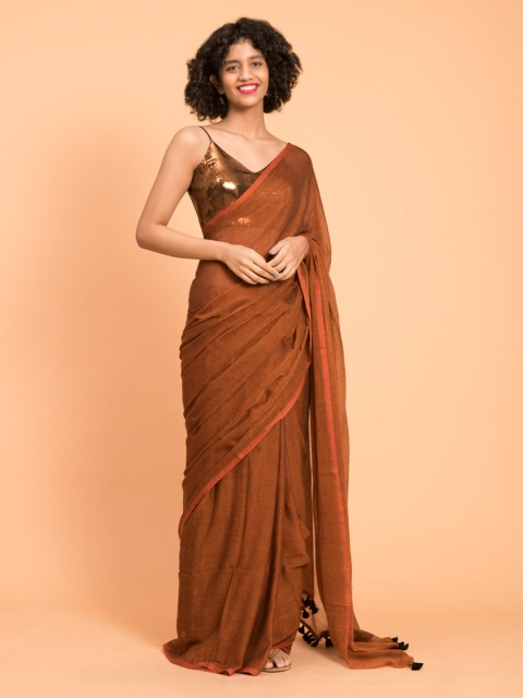 

Suta Rust Brown Solid Pure Cotton Saree