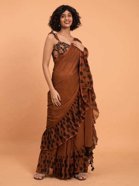 

Suta Brown Solid Pure Cotton Handloom Saree with Polka Printed Ruffle Border