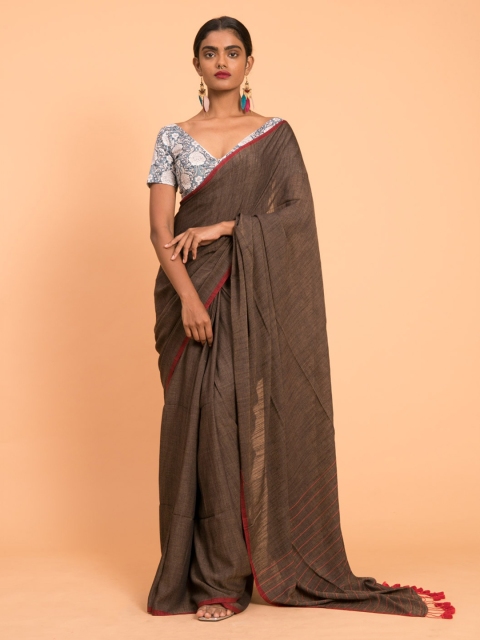 

Suta Brown Solid saree