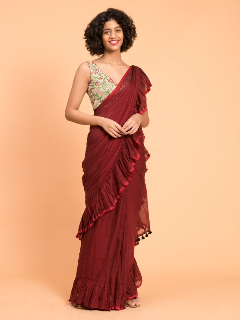 

Suta Maroon Solid Pure Cotton Ruffle Saree