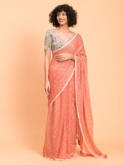 

Suta Peach and White Polka Printed Saree